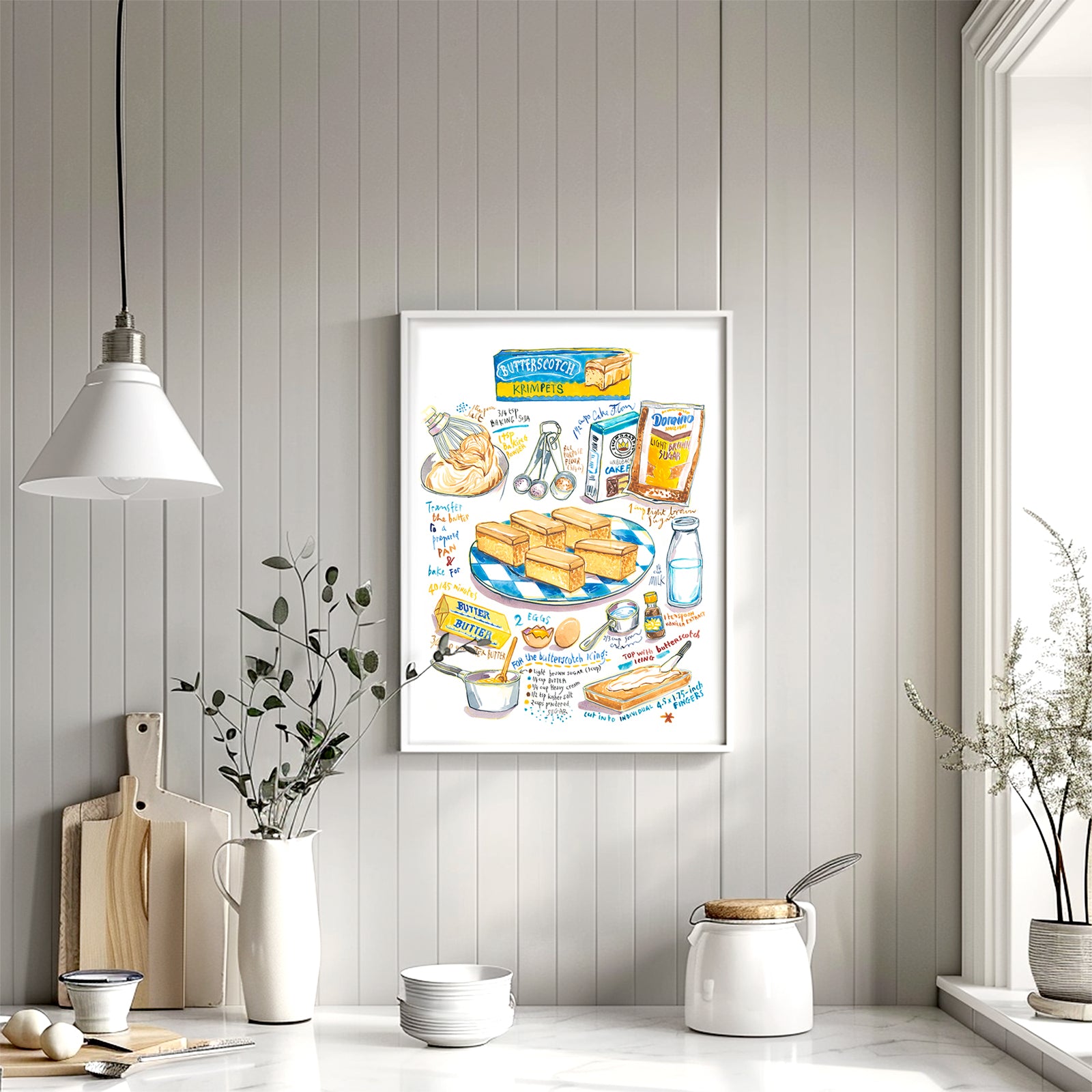 butterscotch krimpets recipe fine art print in watercolor featuring the ingredients and a plate of cookies, along with handwritten instructions in English. The framed poster hanging in a kitchen space.