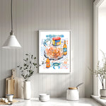 steamed blue crab recipe fine art print in watercolor featuring the ingredients and the finished dish, along with handwritten instructions in English. The framed poster hanging in a kitchen.