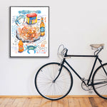steamed blue crab recipe fine art print in watercolor featuring the ingredients and the finished dish, along with handwritten instructions in English. The framed poster hanging in a home space.