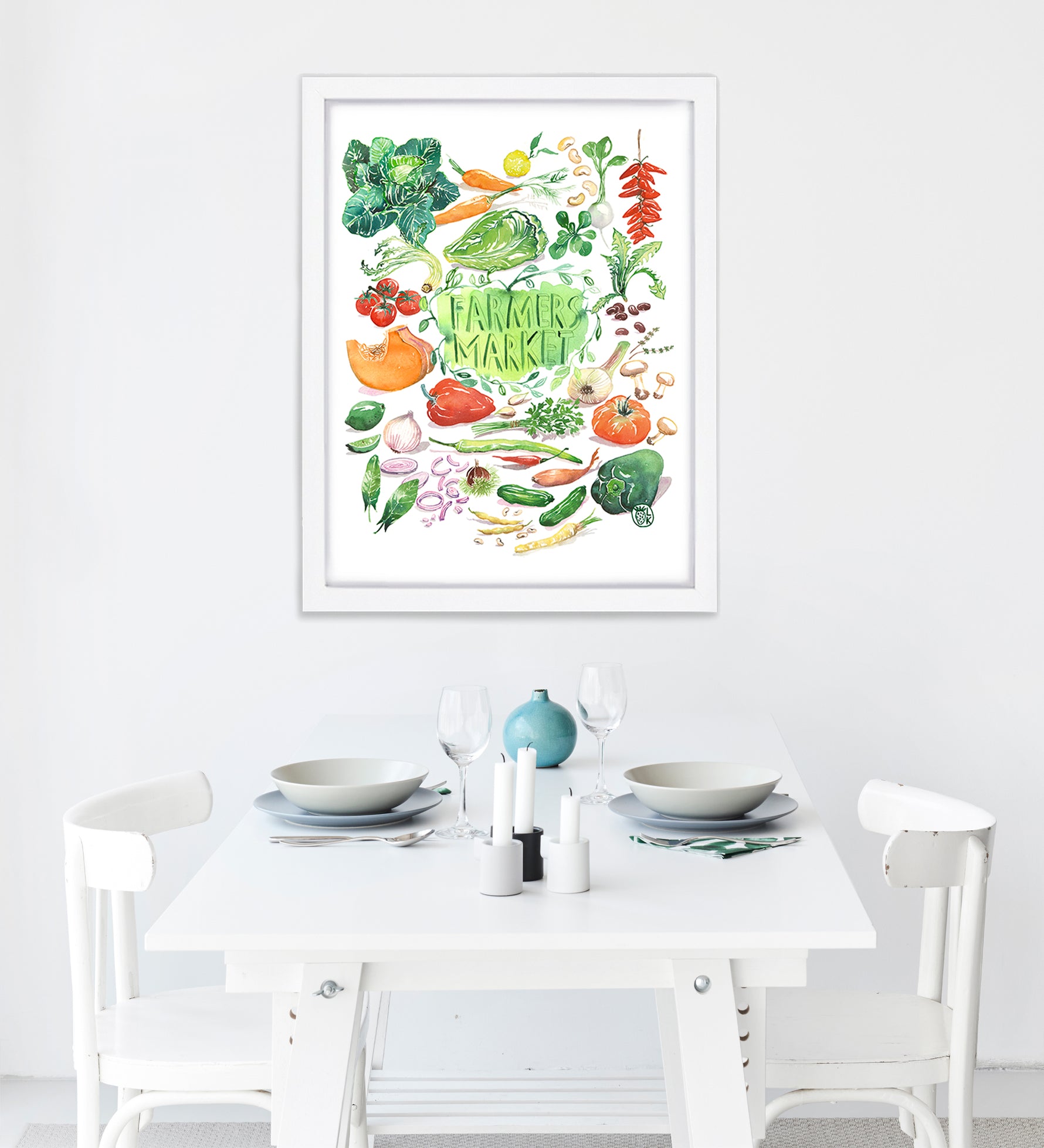hand painted watercolor print featuring many fresh vegetables and " Framers Market " is hand written in the center of the painting. The print is framed in a dining space