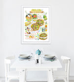 Salted pistachio chocolate chunk cookies recipe fine art print in watercolor featuring the ingredients and two cookies, along with handwritten instructions in English. The framed poster hanging in a dining space.