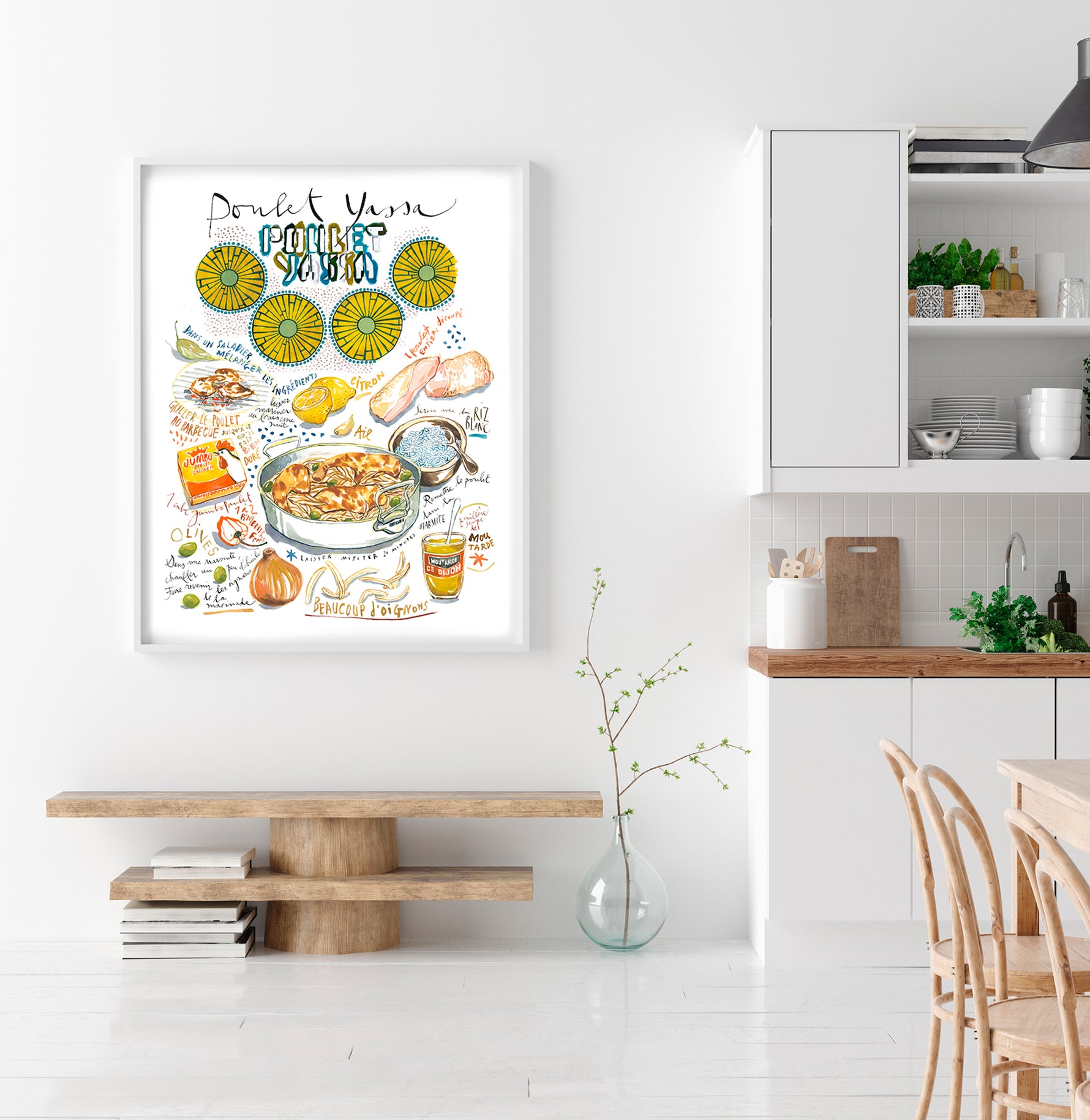 Senegalese yassa chicken recipe fine art print in watercolor featuring the ingredients and the finished dish, along with handwritten instructions in French. The framed poster hanging in a dining space.