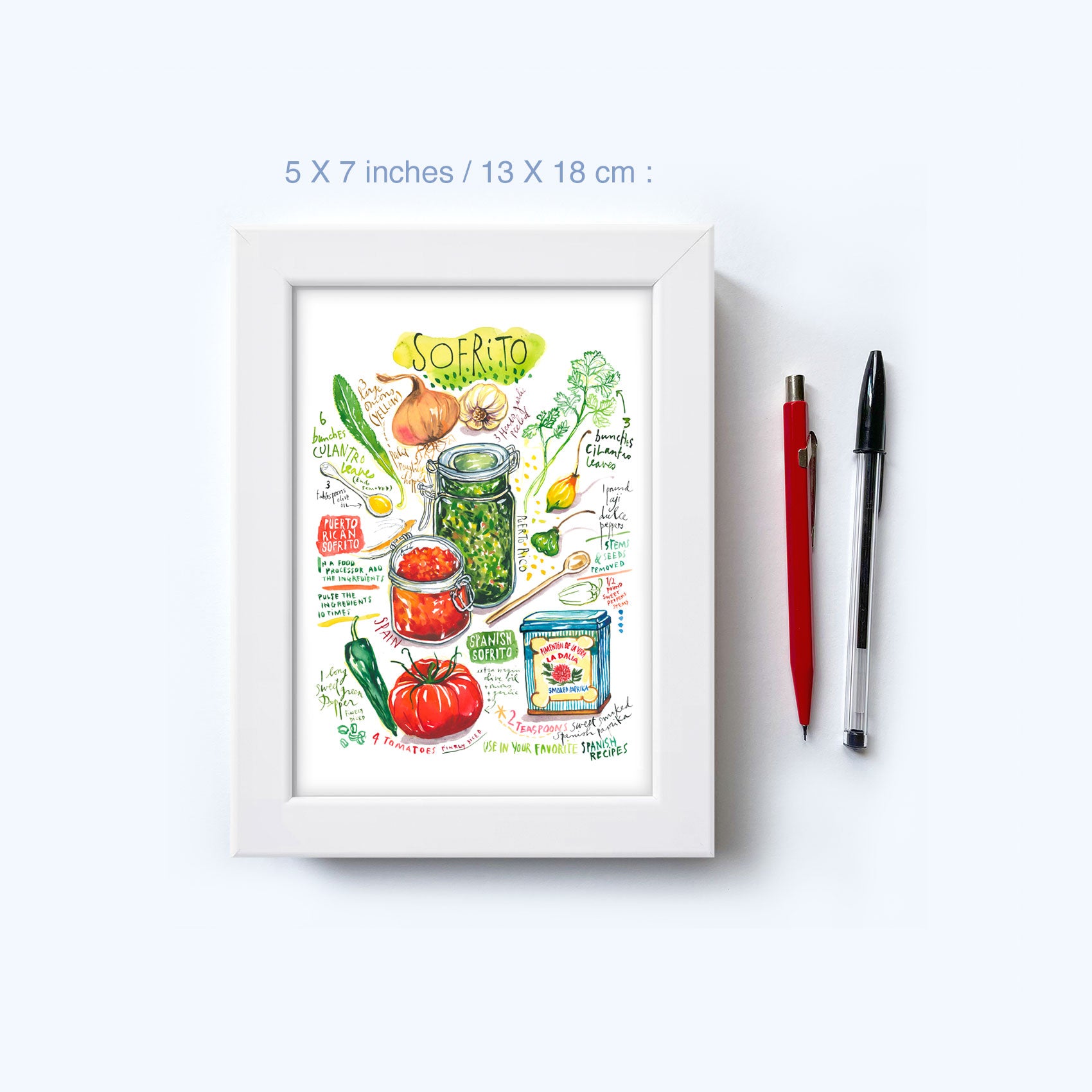 Spanish and Puerto Rican sofrito recipe fine art print in watercolor featuring the ingredients and the finished dish, along with handwritten instructions in English. The framed poster is shown on a white background 